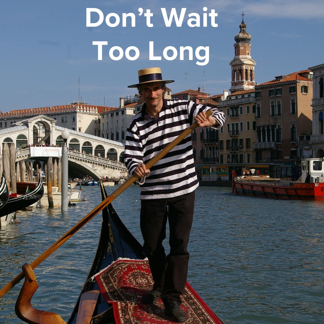 Title 'Don't Wait Too Long' A gondolier is navigating a gondola on a canal in what may be Venice.