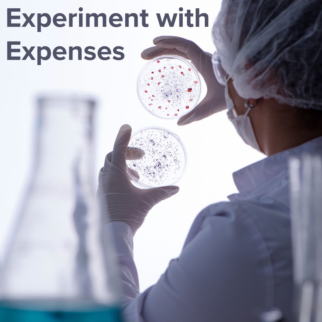 Title 'Experiment with Expenses' in the upper-left. A scientist wearing gloves, a mask, and a hairnet holds two petri dishes up to the light behind a beaker and other scientific glass containers.