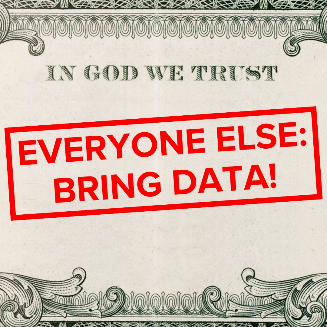 Photo of a blank U.S. dollar will without the amount. On top says 'IN GOD WE TRUST.' Below it what appears to be a red stamp: 'EVERYONE ELSE: BRING DATA!'