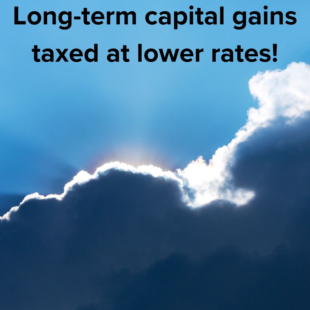 Title 'Long-term capital gains taxed at lower rates!' in black on top. The background is a photo of a dark cloud with a silver lining.