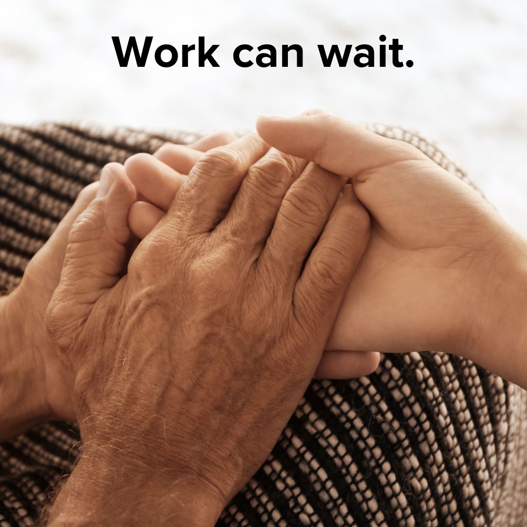 Title 'Work can wait.' in black on top. Below it, two older hands hold a younger person's hand on either furniture or a blanket.